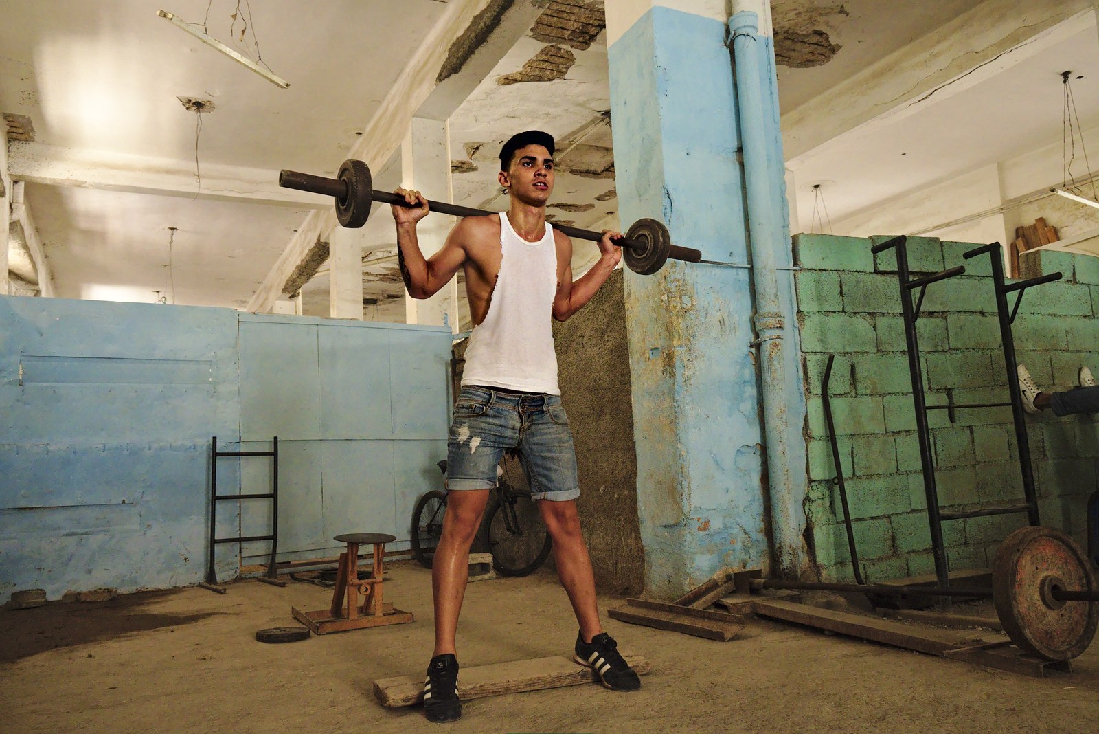 Working out in a warehouse converted into a gym in Centro Habana.