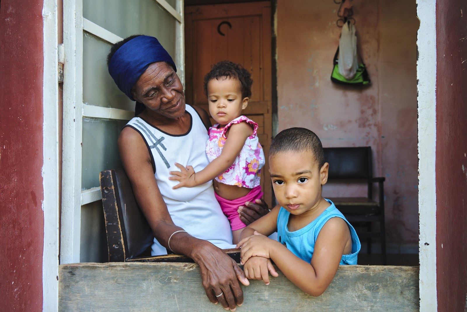 A nanny with the two children at her care at Havana. The two children aren’t siblings.